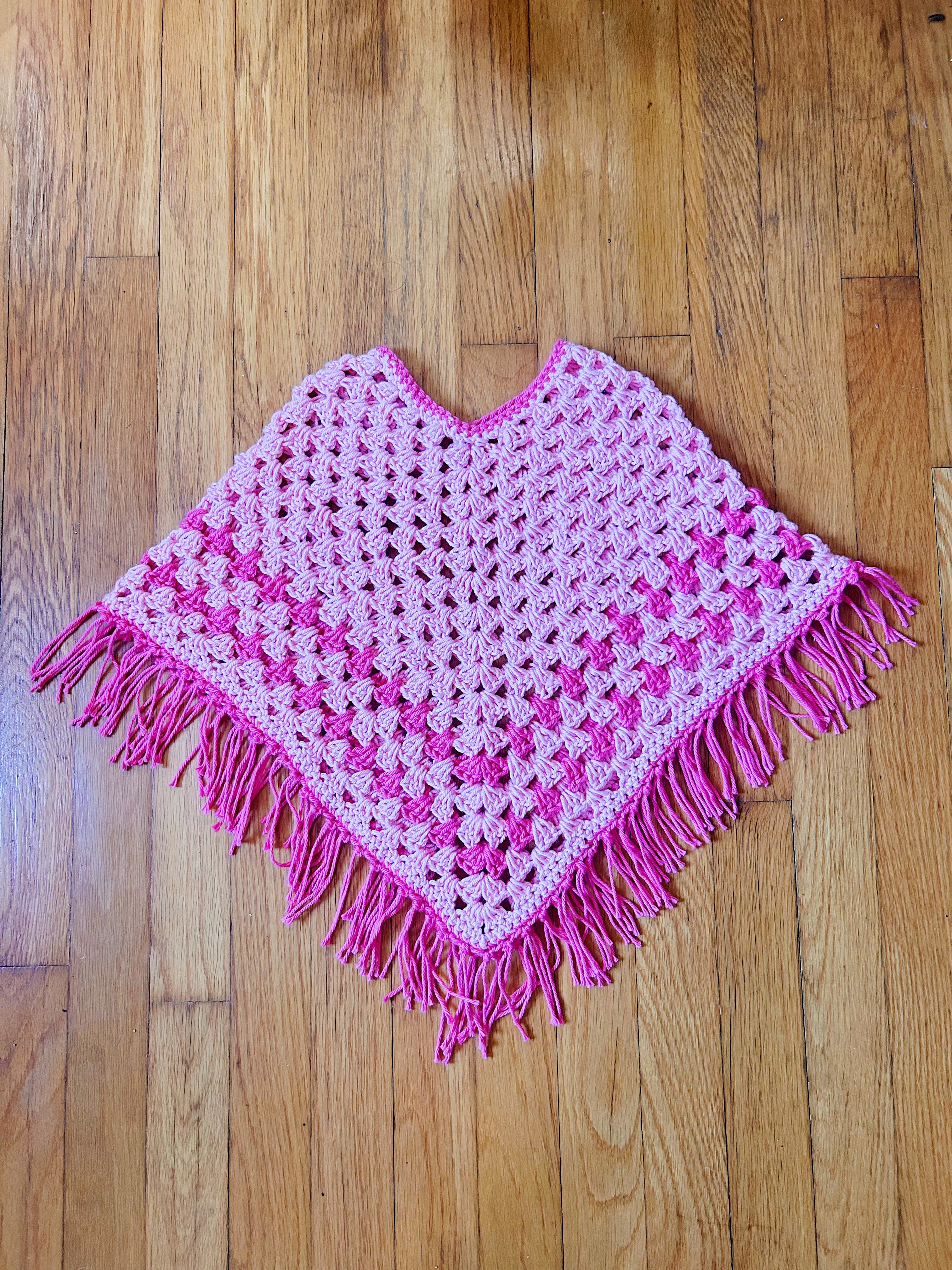 Pink youth poncho